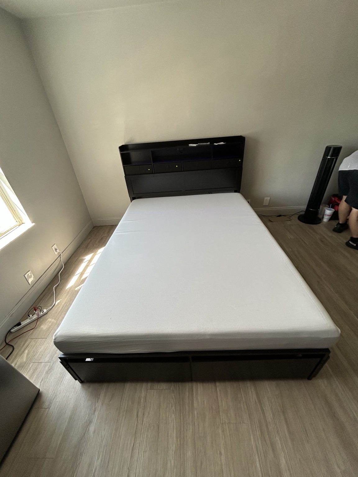 Modern bed frame assembled in a bedroom