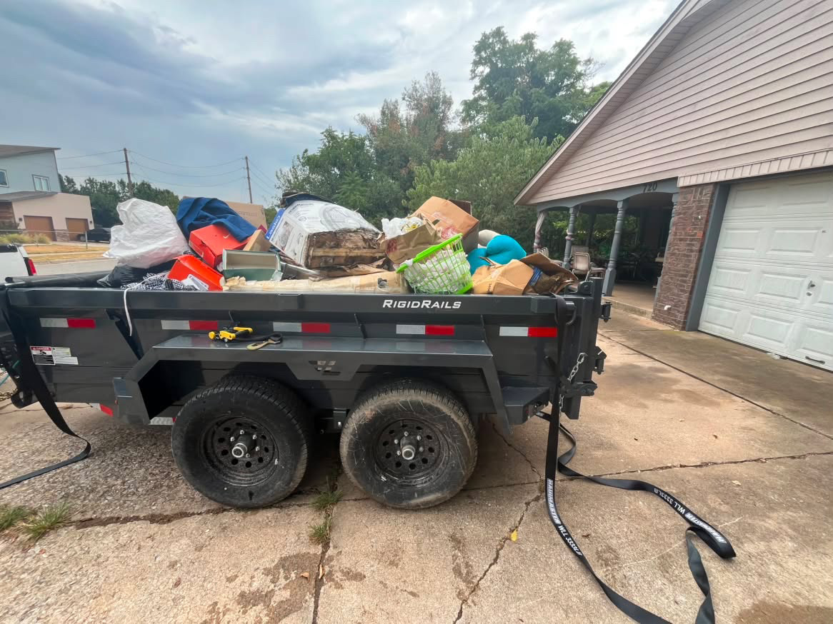 Dump trailer loaded for a large junk-removal haul