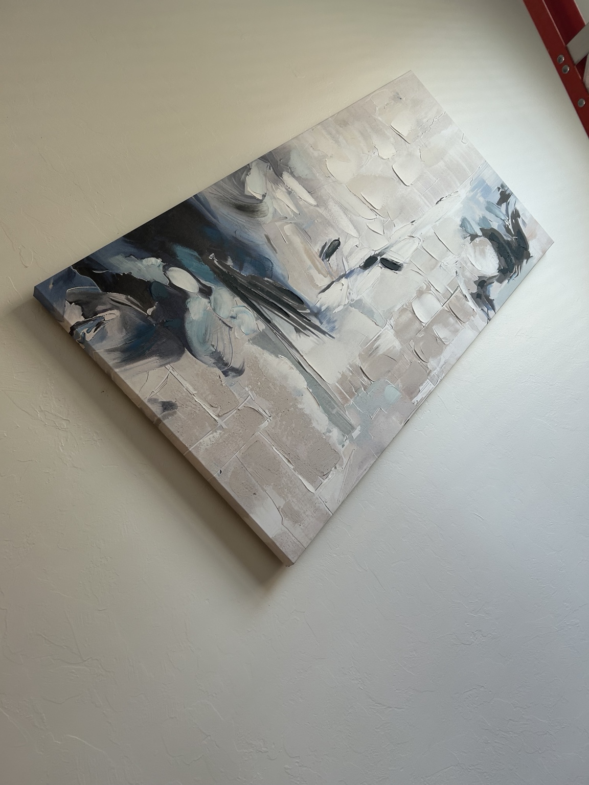 Large canvas wall art mounted securely